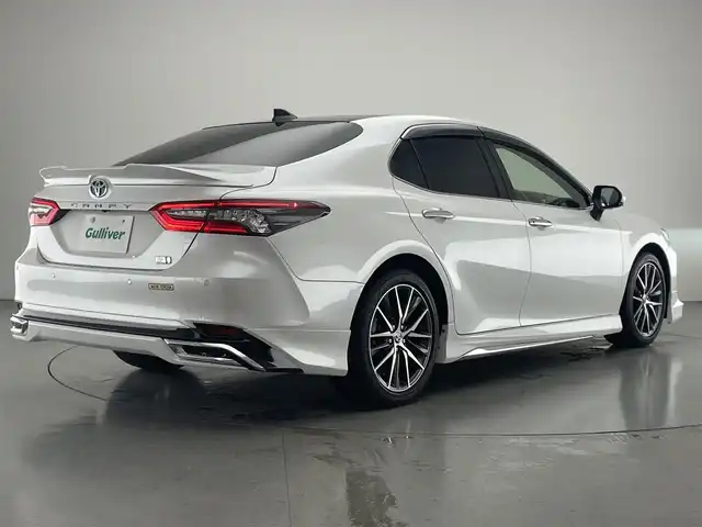 トヨタ カムリ G レザーパッケージ 愛知県 2021(令3)年 1.6万km プラチナホワイトパールマイカ メーカーナビ　純正９イ型DA　全方位カメラ　フルセグTV　パノラマムーンルーフ　モデリスタ　BSM　HUD　JBLサウンド　黒革シート　追従クルコン　ETC2.0　LEDオートライト　フォグ　衝突軽減　車線逸脱　禁煙車