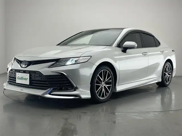 トヨタ カムリ G レザーパッケージ 愛知県 2021(令3)年 1.6万km プラチナホワイトパールマイカ メーカーナビ　純正９イ型DA　全方位カメラ　フルセグTV　パノラマムーンルーフ　モデリスタ　BSM　HUD　JBLサウンド　黒革シート　追従クルコン　ETC2.0　LEDオートライト　フォグ　衝突軽減　車線逸脱　禁煙車