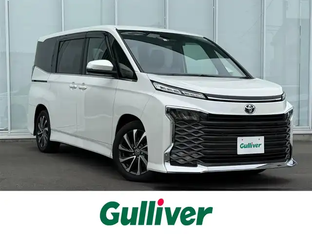 トヨタ ヴォクシー S－Z 神奈川県 2023(令5)年 4.1万km ホワイトパールクリスタルシャイン 純正ディスプレイオーディオナビ　/フルセグ　/ＥＴＣ２．０　/ステマリングヒーター　/前後ドラレコ　/電動リアゲート/シートヒーター　/ドアバイザー　/パワーバックドア　/後席モニター　/オットマン/HDMI　/カーテンエアバッグ/LEDヘッドライト/ABS/横滑り防止装置/コーナーセンサー/レーンキープアシスト/オートマチックハイビーム