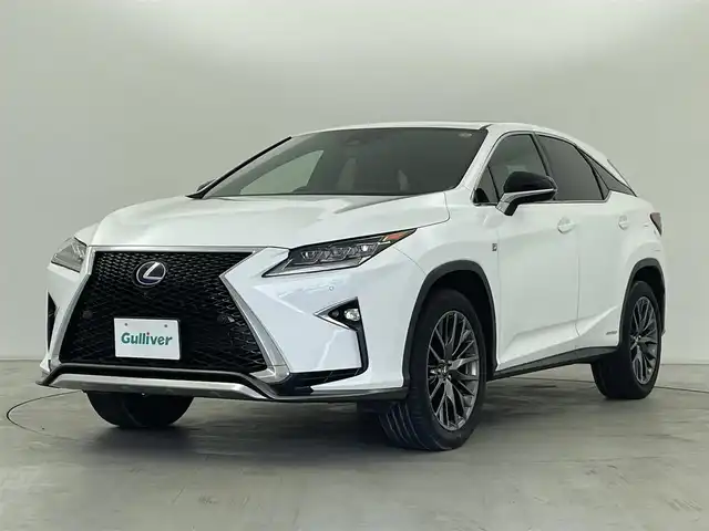 レクサス ＲＸ 450h Fスポーツ 群馬県 2018(平30)年 5.2万km ホワイトノーヴァガラスフレーク ムーンルーフ/パノラミックビューモニター/インテリジェントクリアランスソナー/ブラインドスポットモニター/リアクロストラフィックアラート/3眼LEDヘッドランプ/アダプティブハイビーム/セカンドシートヒーター/セカンドパワーシート/ITS Connect/――――――――――――――/純正12.3インチSDナビ/（フルセグTV/BT/CD/DVD/SD）/パワーバックドア/ステアリングヒーター/前席シートヒーター/シートベンチレーション/前席パワーシート/運転席シートメモリー/レクサスセーフティプラス/　・プリクラッシュセーフティ/　・レーンキーピングアシスト/　・レーダークルーズコントロール/カラーヘッドアップディスプレイ/ビルトインETC2.0/電動パーキングブレーキ/AC100V電源/プッシュスタート/スマートキー