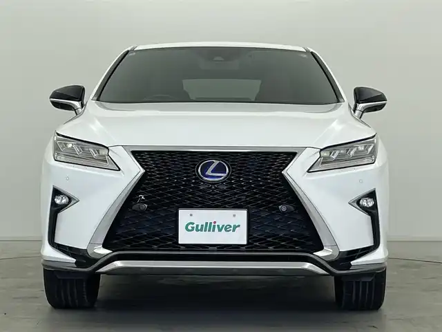 レクサス ＲＸ 450h Fスポーツ 群馬県 2018(平30)年 5.2万km ホワイトノーヴァガラスフレーク ムーンルーフ/パノラミックビューモニター/インテリジェントクリアランスソナー/ブラインドスポットモニター/リアクロストラフィックアラート/3眼LEDヘッドランプ/アダプティブハイビーム/セカンドシートヒーター/セカンドパワーシート/ITS Connect/――――――――――――――/純正12.3インチSDナビ/（フルセグTV/BT/CD/DVD/SD）/パワーバックドア/ステアリングヒーター/前席シートヒーター/シートベンチレーション/前席パワーシート/運転席シートメモリー/レクサスセーフティプラス/　・プリクラッシュセーフティ/　・レーンキーピングアシスト/　・レーダークルーズコントロール/カラーヘッドアップディスプレイ/ビルトインETC2.0/電動パーキングブレーキ/AC100V電源/プッシュスタート/スマートキー