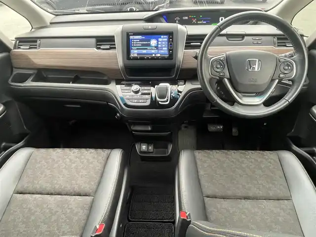 ホンダ フリード ハイブリット クロスター ホンダセンシング 島根県 2021(令3)年 3.6万km プレミアムクリスタルオレンジM 純正メモリナビ　/(フルセグTV/ＤＶＤ再生/Ｂｌｕｅｔｏｏｔｈ接続)　/前後ドライブレコーダー　/バックカメラ　/ビルトインＥＴＣ　/両側パワースライドドア　/前席シートヒーター/渋滞追従機能付アダプティブ・クルーズ・コントロール/リアコーナーセンサー　/レーンアシスト/衝突軽減ブレーキ/　オートハイビーム／ライト　/純正ＬＥＤヘッドライト/純正15インチアルミホイール/純正フロアマット/スマートキー1本