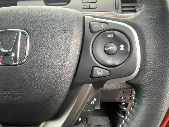 ホンダ フリード ハイブリット クロスター ホンダセンシング 島根県 2021(令3)年 3.6万km プレミアムクリスタルオレンジM 純正メモリナビ　/(フルセグTV/ＤＶＤ再生/Ｂｌｕｅｔｏｏｔｈ接続)　/前後ドライブレコーダー　/バックカメラ　/ビルトインＥＴＣ　/両側パワースライドドア　/前席シートヒーター/渋滞追従機能付アダプティブ・クルーズ・コントロール/リアコーナーセンサー　/レーンアシスト/衝突軽減ブレーキ/　オートハイビーム／ライト　/純正ＬＥＤヘッドライト/純正15インチアルミホイール/純正フロアマット/スマートキー1本