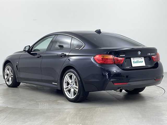 ＢＭＷ ４２０ｉ xDrive グランクーペ Mスポーツ 道央・札幌 2014(平26)年 6万km カーボンブラックM ・4WD/・純正ナビ（TV＆CD＆DVD＆BT）/・バックカメラ/・クルーズコントロール/・レーンキープアシスト/・アイドリングストップ/・横滑り防止/・ステアリングスイッチ/・パドルシフト/・パワーシート/・スマートキー/・スペアキー