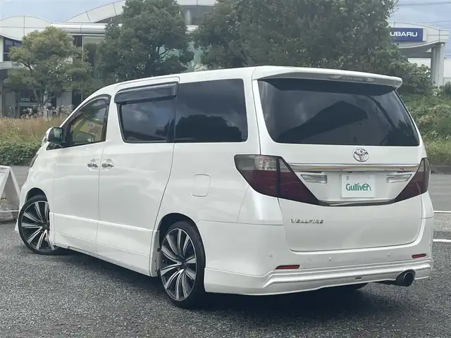 トヨタ ヴェルファイア 2．4Z 神奈川県 2012(平24)年 8.3万km ホワイトパールクリスタルシャイン アルパイン　ビックX９インチ/メモリーナビ/CD/DVD/SD/BT/フルセグ/アルパインフリップダウンモニター/前方ドラレコ/バックカメラ/両側パワーパワースライドドア/バックドアイージークロージャー/ローダウン/社外アルミ　AME２０インチ/社外テール/社外マフラー(rosso modello)/社外セキュリティ（Gｒｇo-ZV）/HIDヘッドライト/社外LEDフォグ/社外カーテシイルミ/社外ダッシュマット/社外USB充電ポート×２/社外シートカバー(clazzio)/7人乗り/オットマンシート/シフトゲートイルミ/コーナーセンサー/ウッドコンビハンドル/オートライト/ナノイーエアコン/リアフィルム/ドアバイザー/スマートキー×２/新車時保証書/取扱説明書/ナビ取扱説明書/セキュリティ取扱説明書/ドラレコ取扱説明書