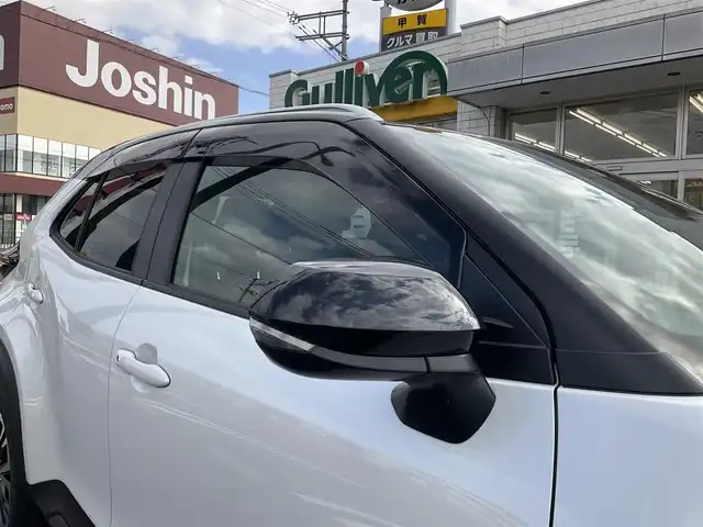 トヨタ ヤリスクロス ハイブリッド Z アドベンチャー 滋賀県 2023(令5)年 2.7万km ブラックマイカ/プラチナホワイトパールマイカ ワンオーナー/トヨタセーフティセンス/レーダークルーズコントロール/純正8インチディスプレイオーディオ/Bluetooth、フルセグテレビ/バックカメラ/ビルトインETC/ハーフレザーシート/前席シートヒーター/運転席パワーシート/ステアリングヒーター/パワーバックドア/純正LEDヘッドライト/純正18インチアルミホイール/スペアキー有り/取扱説明書/保証書