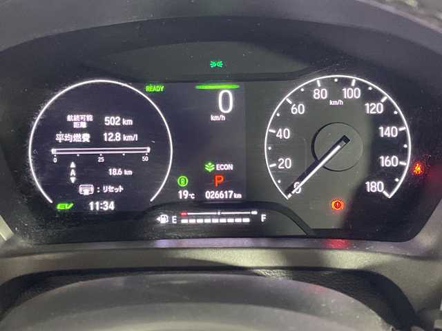 ホンダ ヴェゼル ハイブリッド e:HEV Z 沖縄県 2021(令3)年 2.7万km メテオロイドグレーメタリック 禁煙車　/純正ナビ　/（フルセグＴＶ　ＣＤ　ＤＶＤ　Ｂｌｕｅｔｏｏｔｈ）　/バックカメラ　/ハーフレザー　/衝突被害軽減ブレーキ　/車線逸脱警報機能　/アダプティブクルーズコントロール/オートライト　/ＬＥＤヘッドライト　/電動パーキングブレーキ　/ＥＴＣ/パワーバックドア/ハンドルヒーター
