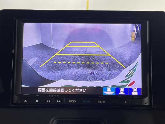 ホンダ ヴェゼル ハイブリッド e:HEV Z 沖縄県 2021(令3)年 2.7万km メテオロイドグレーメタリック 禁煙車　/純正ナビ　/（フルセグＴＶ　ＣＤ　ＤＶＤ　Ｂｌｕｅｔｏｏｔｈ）　/バックカメラ　/ハーフレザー　/衝突被害軽減ブレーキ　/車線逸脱警報機能　/アダプティブクルーズコントロール/オートライト　/ＬＥＤヘッドライト　/電動パーキングブレーキ　/ＥＴＣ/パワーバックドア/ハンドルヒーター