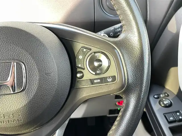 ホンダ Ｎ ＢＯＸ G EX ターボ ホンダセンシング 宮崎県 2018(平30)年 5.1万km ルナシルバーM 純正8型ナビ（VXU-185NBi）/　AM FM CD DVD TV /バックカメラ/ホンダセンシング/バックカメラ/両側パワースライドドア/ウィンカーミラー/純正アルミホイール/ETC/純正ドライブレコーダー/レーダークルーズコントロール/LEDヘッドライト/ウィンカーミラー/電動格納ミラー/スマートキー/プッシュスタート