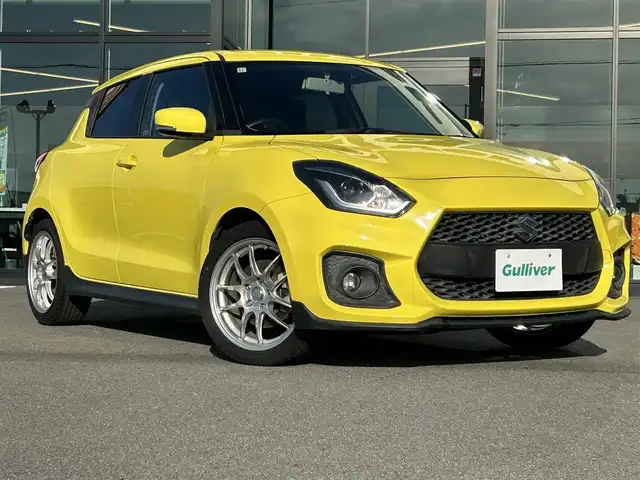 スズキ スイフト スポーツ 愛媛県 2017(平29)年 6.8万km チャンピオンイエロー 純正ナビ（Bluetooth/フルセグTV/DVD再生）/ETC/バックカメラ/クルーズコントロール/iPod接続/前後ドラレコ/シートヒーター/LEDヘッドライト/フォグランプ/スペアキー/ABS/横滑り防止装置/エンケイ17インチアルミホイール