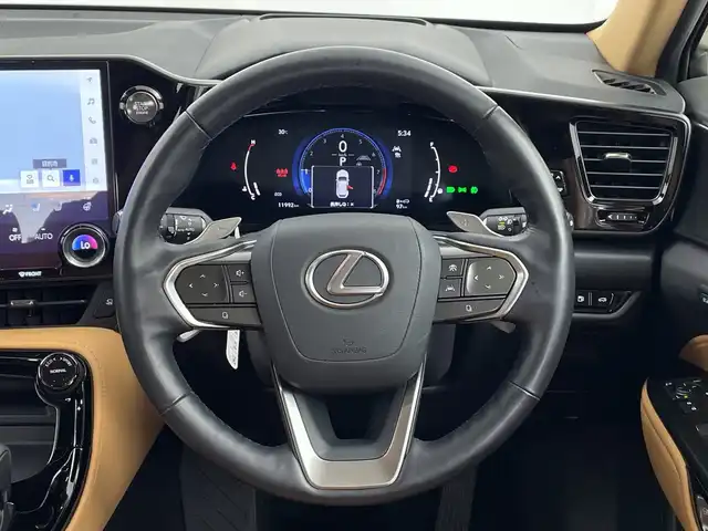 レクサス ＮＸ 250 バージョンL 鹿児島県 2022(令4)年 1.2万km ラグジュアリーホワイトパールクリスタルシャインガラスフレーク ワンオーナー/レクサスセーフティシステム+/・プリクラッシュセーフティ/・レーダークルーズコントロール/・レーントレーシングアシスト/・アダプティブハイビーム/・ロードサインアシスト/・ドライバー異常時対応システム/・プロアクティブドライビングアシスト/・ブラインドスポットモニター/・パーキングサポートブレーキ/・安心降車アシスト/・クリアランスソナー/パノラマルーフ/純正14インチディスプレイオーディオ/・ナビ機能/・フルセグTV/・USB/BT/AM.FM/・Applecarplay/Androidauto/パノラミックビューモニター/パワーバックドア/ビルトイン2.0ETC/シートヒーター/前席エアーシート/D席メモリ付パワーシート/D/N席パワーシート/ステアリングヒーター/パドルシフト/革巻きステアリング/ステアリングスイッチ/ヘッドアップディスプレイ/電動パーキングブレーキ/オートホールド/アイドリングストップ/LEDヘッドライト/フォグランプ/オートライト/純正20インチAW/プッシュスタート/スマートキー/電動格納ウィンカーミラー