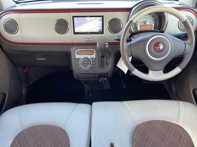 スズキ ラパン ショコラ X 道東・釧路十勝 2014(平26)年 10.9万km カシスピンクパールメタリック ・4WD/・社外SDナビ/（ラジオ CD ワンセグ USB）/・バックカメラ/・社外エンジンスターター/・HIDヘッドライト/・オートライト/・ヘッドライトレベライザー/・革巻きステアリング/・運転席のみシートヒーター/・アイドリングストップ/・電格ウィンカーミラー/・ドアバイザー/・スマートキー/・プッシュスタート/・鉄ホイール付夏用タイヤ積込