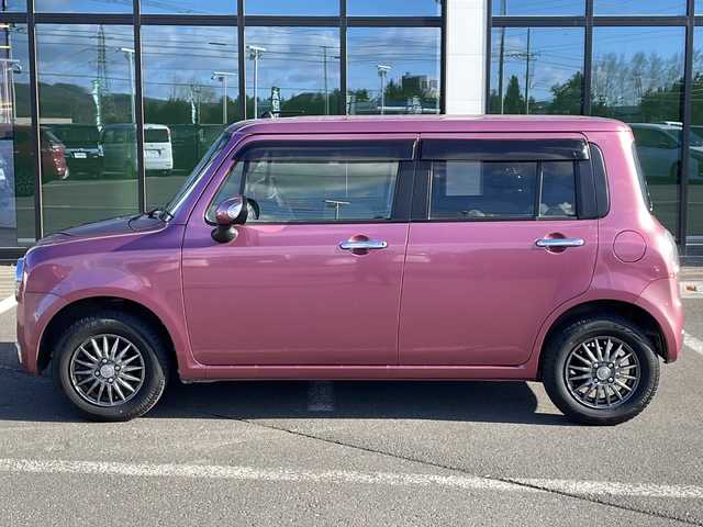 スズキ ラパン ショコラ X 道東・釧路十勝 2014(平26)年 10.9万km カシスピンクパールメタリック ・4WD/・社外SDナビ/（ラジオ CD ワンセグ USB）/・バックカメラ/・社外エンジンスターター/・HIDヘッドライト/・オートライト/・ヘッドライトレベライザー/・革巻きステアリング/・運転席のみシートヒーター/・アイドリングストップ/・電格ウィンカーミラー/・ドアバイザー/・スマートキー/・プッシュスタート/・鉄ホイール付夏用タイヤ積込