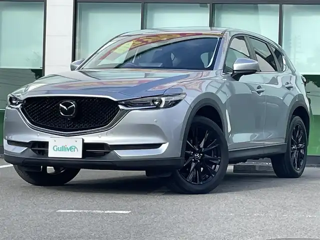 マツダ ＣＸ－５ XD ブラックトーンエディション 和歌山県 2021(令3)年 2万km ソニックシルバーM 純正10.25インチナビ/フルセグTV/Bluetooth/USB/全周囲カメラ/ETC/前後ドライブレコーダー/衝突軽減カメラ/車線逸脱防止機能/レーダークルーズコントロール/BSM/HUD/電動リアゲート/ハーフレーザーシート/運転席パワーシート/シートメモリー/前席シートヒーター/革ステアリング/ステアリングスイッチ/ステアリングヒーター/電動パーキングブレーキ/オートブレーキホールド/LEDヘッドライト/オートライト/プッシュスタート/スマートキー/スペアキー/取扱説明書/保証書