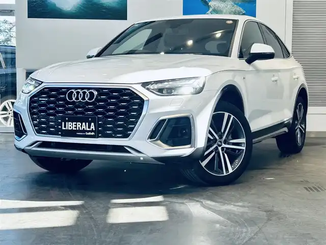 アウディ アウディ Ｑ５ SB 1stエディション 大阪府 2022(令4)年 1.4万km グレイシアホワイトメタリック 230台限定/SラインプラスP/バーチャルコックピット/ACC/純正ナビ/360度カメラ/applecarplay/サイドアシスト/純正20インチAW/LEDヘッドライト/電動リアゲート/黒革/パワーシート/Dシートメモリ/シートヒーター/パドルシフト/ETC
