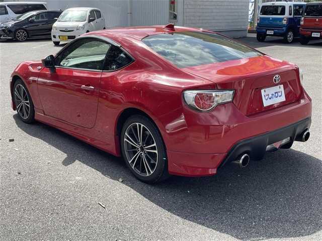 トヨタ ８６ GT 栃木県 2014(平26)年 11.3万km ライトニングレッド (株)IDOMが運営する【じしゃロン宇都宮店】の自社ローン専用車両になります。こちらは現金またはオートローンご利用時の価格です。自社ローンご希望の方は別途その旨お申付け下さい/禁煙車/モデリスタエアロ/社外７型ナビ/Ｂｌｕｅｔｏｏｔｈ接続/ＣＤ/バックカメラ/ドライブレコーダー/パドルシフト/ＥＴＣ/カーテンエアバック/純正アルミホイール/プッシュスタート/スマートキー