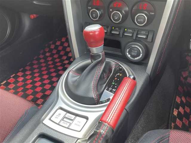 トヨタ ８６ GT 栃木県 2014(平26)年 11.3万km ライトニングレッド (株)IDOMが運営する【じしゃロン宇都宮店】の自社ローン専用車両になります。こちらは現金またはオートローンご利用時の価格です。自社ローンご希望の方は別途その旨お申付け下さい/禁煙車/モデリスタエアロ/社外７型ナビ/Ｂｌｕｅｔｏｏｔｈ接続/ＣＤ/バックカメラ/ドライブレコーダー/パドルシフト/ＥＴＣ/カーテンエアバック/純正アルミホイール/プッシュスタート/スマートキー