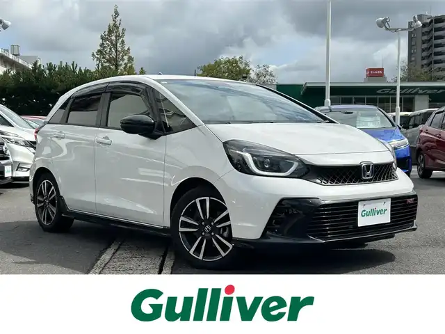 ホンダ フィット e:HEV RS 島根県 2023(令5)年 1.5万km プラチナホワイトパール 純正ＳＤナビ　/Ｂｌｕｅｔｏｏｔｈ接続　/前後ドライブレコーダー　/ビルトインＥＴＣ　/バックカメラ　/アダプティブクルーズコントロール/衝突軽減ブレーキ　/レーンアシスト/電動パーキングブレーキ/パドルシフト　/前後コーナーセンサー　/横滑り防止装置/アイドリングストップ　/スマートキー/プッシュスタート/純正LEDヘッドライト/純正16インチアルミホイール　/純正フロアマット