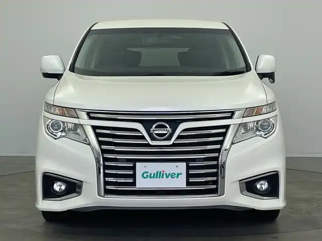 日産 エルグランド 250ハイウェイスターS 新潟県 2018(平30)年 3.8万km ブリリアントホワイトパール 純正9インチナビ MM518D-L/(フルセグ Bluetooth AM FM CD DVD Blueray SD iPod USB)/フリップダウンモニター/両側パワースライドドア/クルーズコントロール/ETC/AFS/キャプテンシート/オットマン/ドライブレコーダー/社外フロアマット/純正ドアバイザー/合皮ハーフレザーシート/LEDヘッドライト/オートライト/フロントフォグ/プッシュスタート/スマートキー/スペアキー/純正アルミホイール/取扱説明書/ダブルオートエアコン/ダブル+カーテンエアバッグ