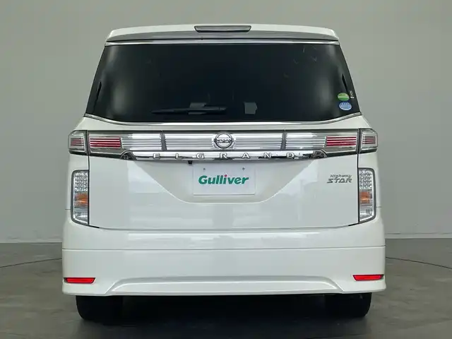 日産 エルグランド 250ハイウェイスターS 新潟県 2018(平30)年 3.8万km ブリリアントホワイトパール 純正9インチナビ MM518D-L/(フルセグ Bluetooth AM FM CD DVD Blueray SD iPod USB)/フリップダウンモニター/両側パワースライドドア/クルーズコントロール/ETC/AFS/キャプテンシート/オットマン/ドライブレコーダー/社外フロアマット/純正ドアバイザー/合皮ハーフレザーシート/LEDヘッドライト/オートライト/フロントフォグ/プッシュスタート/スマートキー/スペアキー/純正アルミホイール/取扱説明書/ダブルオートエアコン/ダブル+カーテンエアバッグ