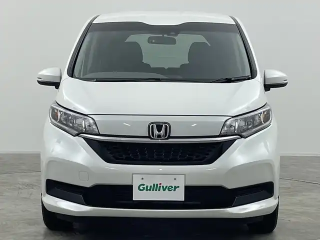 ホンダ フリード G 群馬県 2023(令5)年 1.8万km プラチナホワイトパール 衝突被害軽減ブレーキ ナビ　バックカメラ　両側電動スライドドア　アダプティブクルーズコントロール　アイドリングストップ　シートヒーター　オートライト　ステアリングリモコン　スマートキー　禁煙車