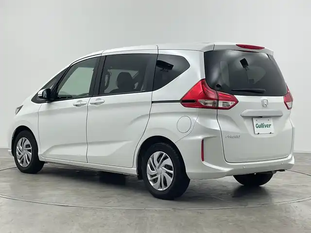 ホンダ フリード G 群馬県 2023(令5)年 1.8万km プラチナホワイトパール 衝突被害軽減ブレーキ ナビ　バックカメラ　両側電動スライドドア　アダプティブクルーズコントロール　アイドリングストップ　シートヒーター　オートライト　ステアリングリモコン　スマートキー　禁煙車