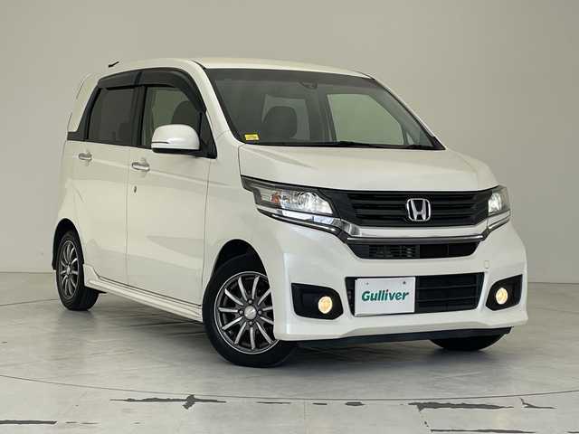 ホンダ Ｎ ＷＧＮ カスタム G Aパッケージ 沖縄県 2013(平25)年 9.3万km プレミアムホワイトパール 社外ナビ　【AVIC-ZH0009】/　(ＣＤ　ＤＶＤ　フルセグＴＶ　Ｂｌｕｅｔｏｏｔｈ　USB)/ドライブレコーダー前方/ＥＴＣ/クルーズコントロール/ハーフレザーシート/革巻きステアリング/ＨＩＤヘッドライト/純正フロアマット/プッシュスタート/スマートキー/スペアキー有り/純正14インチアルミホイール