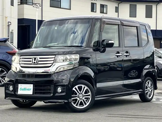 ホンダ Ｎ ＢＯＸ カスタム SSパッケージ 静岡県 2014(平26)年 6.9万km スマートブラック エンジンスタートボタン/パワーステアリング/パワーウィンドウ/アイドリングストップ/スマートキー/スペアキー1本/オートエアコン/取扱説明書/ETC/メモリナビ/ドライブレコーダー/ベンチシート/布シート/両側パワスラ/フロアマット/純正アルミホイール/ABS/横滑り防止装置/オートライト/キセノン/Ｗ+サイドエアバッグ/衝突軽減システム/カーテンエアバッグ