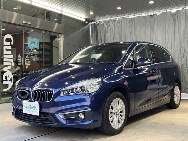 ＢＭＷ ２１８ｉ アクティブツアラー ラグジュアリー 東京都 2015(平27)年 4.4万km 紺 アクテゥブツアラーラグジャアリー/茶レザーシート/シートメモリー/電動シート/ヒーター/純正ナビゲーション/Bカメラ/ドライブレコーダー（前後）/ETC/フォグランプ（前後）/リアスポイラー/パワーバックドア/スポーツモード機能/SYNC （左右温度調整機能）/ドライビングアシスト/・レーンディパーチャーウォーニング/・前車接近警告機能/・衝突回避被害軽減ブレーキ/純正アルミホイール16インチ/純正フロアマット/メーカー保証書/取扱説明書/点検整備記録簿/・H27282931年R12345年/スマートキー
