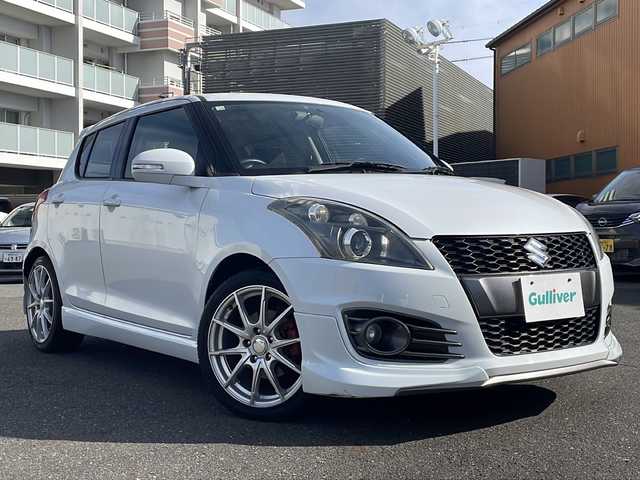 スズキ スイフト スポーツ 静岡県 2014(平26)年 11万km スノーホワイトパール ワンオーナー/6速マニュアル/社外HDDナビ・フルセグTV/CD/DVD/SD/Bluetooth)/社外１７インチアルミホイール/クルーズコントロール/ステアリングスイッチ/ETC/スマートキー２個/プッシュスタート/取扱説明書/新車時保証書