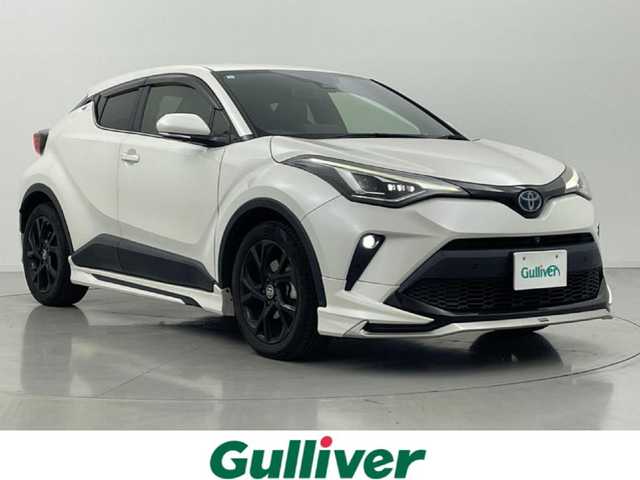 トヨタ Ｃ－ＨＲ G モード ネロ セーフティプラス 佐賀県 2020(令2)年 6.2万km ホワイトパールクリスタルシャイン 禁煙車　/純正８インチディスプレイオーディオ（ＡｐｐｌＣａｒＰｌａｙ・ＢＴ）　全周囲カメラ　/ＥＴＣ　/前後クリアランスソナー　/モデリスタフルエアロ　/Toyota Safety Sense/・プリクラッシュセーフティ/・レーントレーシングアシスト/・オートマチックハイビーム/・レーダークルーズコントロール/・ロードサインアシスト/・ブラインドスポットモニター/横滑り防止/ハーフレザーシート/純正フロアマット/純正１８インチAW/オートライト/LEDヘッドライト/フォグライト/スマートキー/プッシュスタート/保証書/取扱説明書