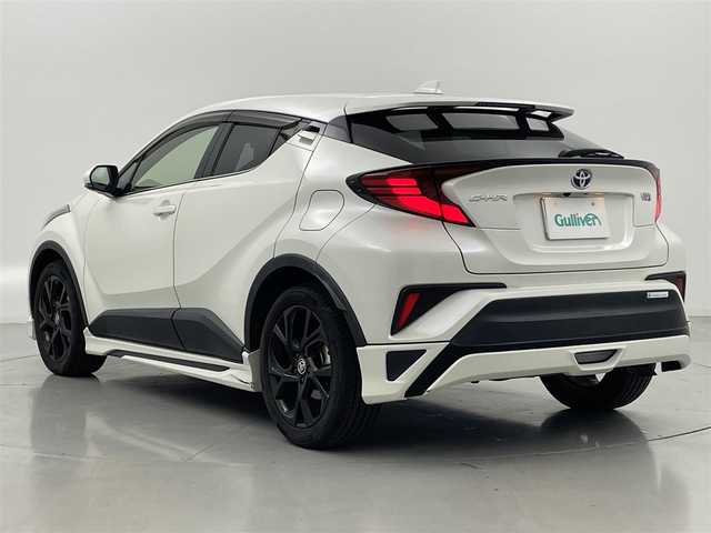 トヨタ Ｃ－ＨＲ G モード ネロ セーフティプラス 佐賀県 2020(令2)年 6.2万km ホワイトパールクリスタルシャイン 禁煙車　/純正８インチディスプレイオーディオ（ＡｐｐｌＣａｒＰｌａｙ・ＢＴ）　全周囲カメラ　/ＥＴＣ　/前後クリアランスソナー　/モデリスタフルエアロ　/Toyota Safety Sense/・プリクラッシュセーフティ/・レーントレーシングアシスト/・オートマチックハイビーム/・レーダークルーズコントロール/・ロードサインアシスト/・ブラインドスポットモニター/横滑り防止/ハーフレザーシート/純正フロアマット/純正１８インチAW/オートライト/LEDヘッドライト/フォグライト/スマートキー/プッシュスタート/保証書/取扱説明書