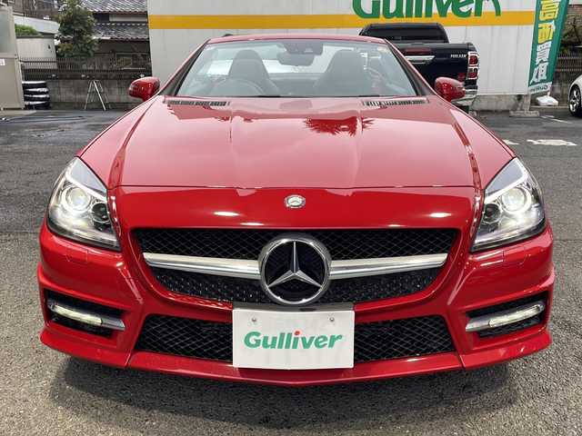 メルセデス・ベンツ ＳＬＫ２００ ブルーエフィシェンシースポーツ 東京都 2012(平24)年 3万km ファイアオパール ワンオーナー/ダイナミックハンドリングパッケージ/リバース連動電動格納ドアミラー/ステアリングスイッチ/革シート/パワーシート（運転席/助手席）/シートヒーター（運転席/助手席）/ETC/HIDヘッドライト/新車時保証書/ナビ/車両取扱説明書