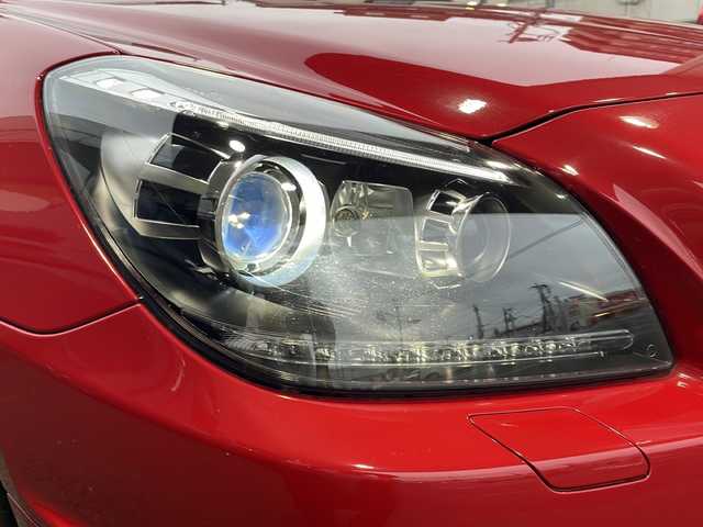 メルセデス・ベンツ ＳＬＫ２００ ブルーエフィシェンシースポーツ 東京都 2012(平24)年 3万km ファイアオパール ワンオーナー/ダイナミックハンドリングパッケージ/リバース連動電動格納ドアミラー/ステアリングスイッチ/革シート/パワーシート（運転席/助手席）/シートヒーター（運転席/助手席）/ETC/HIDヘッドライト/新車時保証書/ナビ/車両取扱説明書