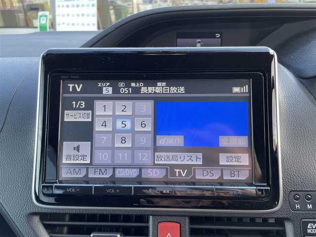 トヨタ ノア ハイブリッド X 長野県 2014(平26)年 10万km ダークシェリーマイカM 純正SDナビ/・Bluetooth/CD/DVD/TV/バックカメラ/フリップダウンモニター/純正ETC/社外ドライブレコーダー前方/ウォークスルー/純正フロアマット/両側パワースライド/社外15インチAW/LEDオートライト/スマートキー/純正AWノーマルタイヤ積み込み/電格ミラー/取り扱い説明書/保証書