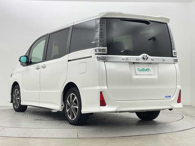 トヨタ ヴォクシー ZS 煌Ⅲ 新潟県 2021(令3)年 3.2万km ホワイトパールクリスタルシャイン トヨタセーフティセンス/純正10インチSDナビ/　　CD/DVD/AM/FM/フルセグ/BT/HDMI/USB/バックモニター/クルーズコントロール/両側パワースライドドア/LEDオートライト/オートマチックハイビーム/ハーフレザーシート/純正16インチアルミホイール付/アイドリングストップ/リアオートエアコン/純正フロアマット/リアサンシェード/デジタルインナーミラー/スペアキー/スマートキー/ETC2.０