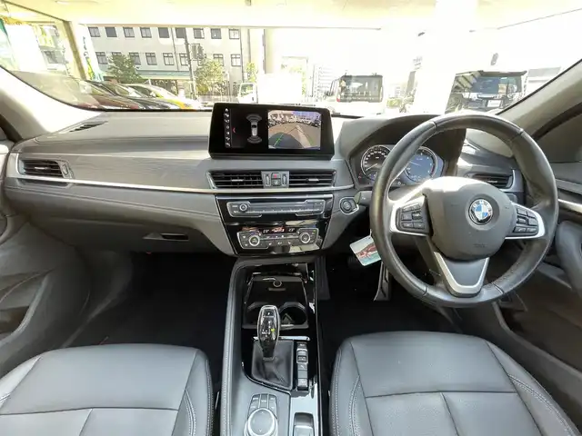 ＢＭＷ Ｘ１ xDrive 18d xライン 岡山県 2019(令1)年 5.7万km ミネラルグレー 登録時走行距離56595キロ/純正10.25インチナビ/AM/FM/Bluetooth/TV/インテリジェントセーフテイ/・アクティブクルーズコントロール/・衝突回避ブレーキ/・前車接近警告機能/コーナーセンサー/バックカメラ/電動リアゲート/シートヒーター/パワーシート/純正１９インチAW/LEDヘッドライト/プッシュスタート/スマートキー/ETC