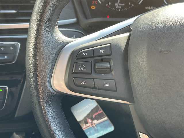 ＢＭＷ Ｘ１ xDrive 18d xライン 岡山県 2019(令1)年 5.7万km ミネラルグレー 登録時走行距離56595キロ/純正10.25インチナビ/AM/FM/Bluetooth/TV/インテリジェントセーフテイ/・アクティブクルーズコントロール/・衝突回避ブレーキ/・前車接近警告機能/コーナーセンサー/バックカメラ/電動リアゲート/シートヒーター/パワーシート/純正１９インチAW/LEDヘッドライト/プッシュスタート/スマートキー/ETC