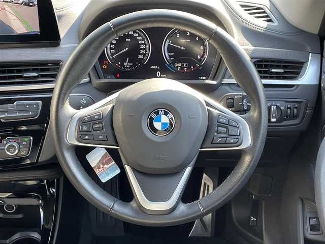 ＢＭＷ Ｘ１ xDrive 18d xライン 岡山県 2019(令1)年 5.7万km ミネラルグレー 登録時走行距離56595キロ/純正10.25インチナビ/AM/FM/Bluetooth/TV/インテリジェントセーフテイ/・アクティブクルーズコントロール/・衝突回避ブレーキ/・前車接近警告機能/コーナーセンサー/バックカメラ/電動リアゲート/シートヒーター/パワーシート/純正１９インチAW/LEDヘッドライト/プッシュスタート/スマートキー/ETC