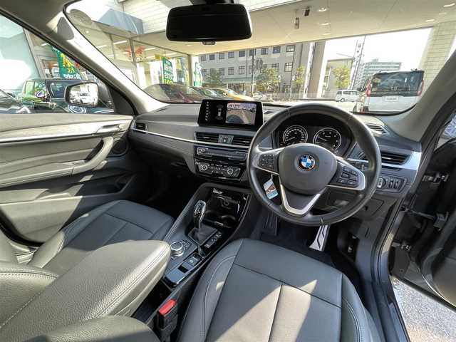 ＢＭＷ Ｘ１ xDrive 18d xライン 岡山県 2019(令1)年 5.7万km ミネラルグレー 登録時走行距離56595キロ/純正10.25インチナビ/AM/FM/Bluetooth/TV/インテリジェントセーフテイ/・アクティブクルーズコントロール/・衝突回避ブレーキ/・前車接近警告機能/コーナーセンサー/バックカメラ/電動リアゲート/シートヒーター/パワーシート/純正１９インチAW/LEDヘッドライト/プッシュスタート/スマートキー/ETC