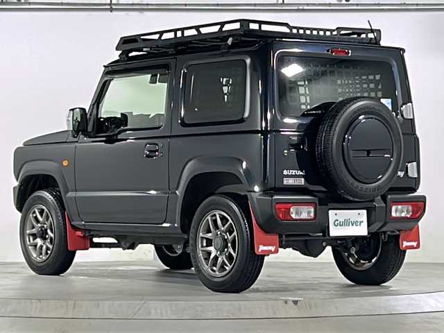 スズキ ジムニー XC 広島県 2021(令3)年 3.2万km ブルーイッシュブラックパール3 禁煙/社外グリル/ルーフキャリア/スズキセーフティサポート/・デュアルブレーキサポート/・ハイビームアシスト/・車線逸脱警報/クルーズコントロール/純正ディスプレイオーディオ（PVH-9300DVSZS）/・CD/DVD/Bluetooth/USB/革巻きステアリング/ステアリングスイッチ/オートライト/ヘッドランプウォッシャー/革調シートカバー/シートヒーター/LEDヘッドライト/フォグランプ/スマートキー/プッシュスタート/ETC/純正ドライブレコーダー/マッドフラップ