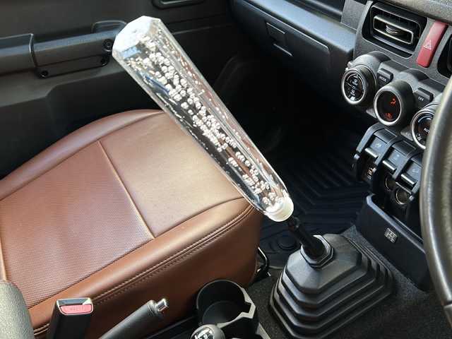 スズキ ジムニー XC 広島県 2021(令3)年 3.2万km ブルーイッシュブラックパール3 禁煙/社外グリル/ルーフキャリア/スズキセーフティサポート/・デュアルブレーキサポート/・ハイビームアシスト/・車線逸脱警報/クルーズコントロール/純正ディスプレイオーディオ（PVH-9300DVSZS）/・CD/DVD/Bluetooth/USB/革巻きステアリング/ステアリングスイッチ/オートライト/ヘッドランプウォッシャー/革調シートカバー/シートヒーター/LEDヘッドライト/フォグランプ/スマートキー/プッシュスタート/ETC/純正ドライブレコーダー/マッドフラップ