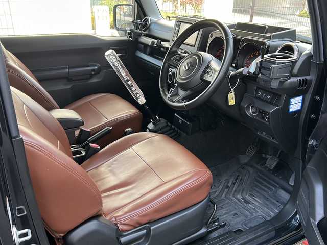 スズキ ジムニー XC 広島県 2021(令3)年 3.2万km ブルーイッシュブラックパール3 禁煙/社外グリル/ルーフキャリア/スズキセーフティサポート/・デュアルブレーキサポート/・ハイビームアシスト/・車線逸脱警報/クルーズコントロール/純正ディスプレイオーディオ（PVH-9300DVSZS）/・CD/DVD/Bluetooth/USB/革巻きステアリング/ステアリングスイッチ/オートライト/ヘッドランプウォッシャー/革調シートカバー/シートヒーター/LEDヘッドライト/フォグランプ/スマートキー/プッシュスタート/ETC/純正ドライブレコーダー/マッドフラップ