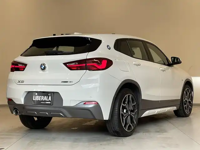 ＢＭＷ Ｘ２ sDrive18i MスポーツX 熊本県 2022(令4)年 2.4万km アルピンホワイトⅢ 純正HDDナビ（Bluetooth、AUX）/バックカメラ/コーナーセンサー/ハーフレザーシート/純正19インチアルミホイール/LEDヘッドライト/インテリジェントセーフティ/ミラー一体型ETC/ドライブレコーダー