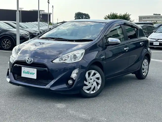 トヨタ アクア S 奈良県 2015(平27)年 5.8万km ダークバイオレットマイカメタリック 純正ナビ（NSZT-W62G）/（ＴＶ／ＢＴ／ＣＤ／ＤＶＤ）/バックカメラ/前席シートヒーター/横滑り防止/前後ドライブレコーダー（ZDR016）/電動格納ミラー/オートライト/ＥＴＣ/ステアリングスイッチ/純正ホイールキャップ/保証書/取り扱い説明書/スペアキーX1