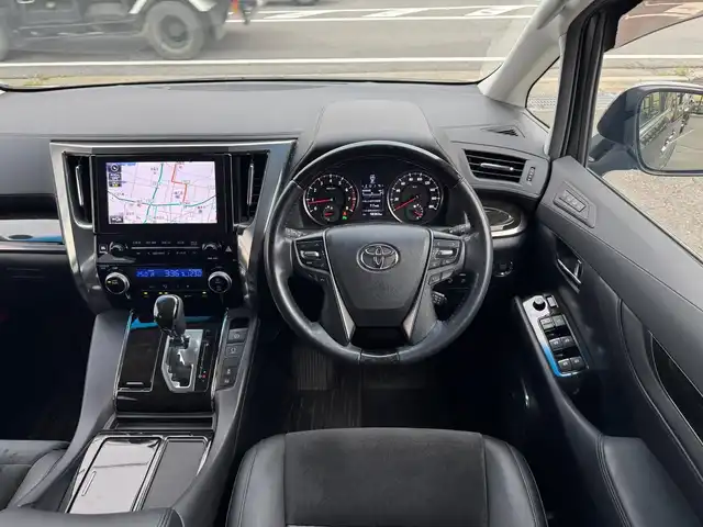 トヨタ ヴェルファイア Z Gエディション 滋賀県 2015(平27)年 5.9万km スパークリングブラックパールクリスタルシャイン ワンオーナー/T-Connect SDナビゲーションシステム/　＋JBLプレミアムサウンドシステム/　Blu-ray DVD CD SD AM/FM サウンドライブラリー/プリクラッシュセーフティシステム（ミリ波レーダー方式）パノラミックビューモニター/レーダークルーズコントロール/インテリジェンスクリアランスソナー /12.1型リヤシートエンターテインメントシステム/パワーバックドア/両側パワースライドドア/ナノイー/ビルトインETC/ドライブレコーダー/ヘッドランプ（LED［ハイ・ロービーム］//　オートレベリング機能付＋LEDクリアランスランプ）/ステアリングヒーター/スペアタイヤ/純正18インチアルミ/