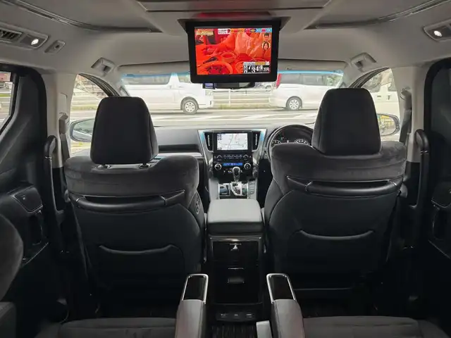 トヨタ ヴェルファイア Z Gエディション 滋賀県 2015(平27)年 5.9万km スパークリングブラックパールクリスタルシャイン ワンオーナー/T-Connect SDナビゲーションシステム/　＋JBLプレミアムサウンドシステム/　Blu-ray DVD CD SD AM/FM サウンドライブラリー/プリクラッシュセーフティシステム（ミリ波レーダー方式）パノラミックビューモニター/レーダークルーズコントロール/インテリジェンスクリアランスソナー /12.1型リヤシートエンターテインメントシステム/パワーバックドア/両側パワースライドドア/ナノイー/ビルトインETC/ドライブレコーダー/ヘッドランプ（LED［ハイ・ロービーム］//　オートレベリング機能付＋LEDクリアランスランプ）/ステアリングヒーター/スペアタイヤ/純正18インチアルミ/