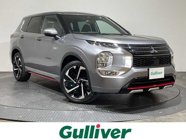 三菱 アウトランダー ＰＨＥＶ P 愛媛県 2022(令4)年 3.6万km チタニウムグレーメタリック BOSEプレミアムサウンドシステム//純正9インチナビ/(Bluetooth/フルセグ/USB)/全周囲カメラ/マイパイロット/BOSEサウンドシステム/衝突被害軽減ブレーキ/レーンキープアシスト/前後コーナーセンサー/ETC2.0/ブラインドスポットモニター/シートヒーター/パワーシート/シートメモリー/ワイヤレス充電/パドルシフト/オートホールド/オートマチックハイビーム/オートライト/スペアキー/保証書/取扱説明書