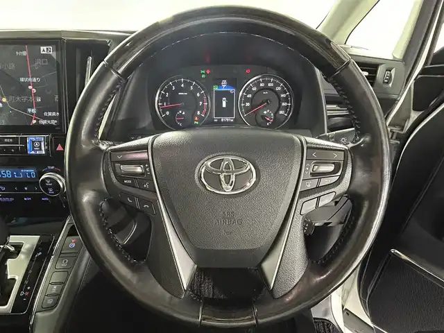 トヨタ ヴェルファイア Z Gエディション 佐賀県 2017(平29)年 8.2万km ホワイトパールクリスタルシャイン 社外アルパイン製11インチナビ【EX11V】/【フルセグTV.CD.DVD.Bluetooth】/社外アルパイン製12.8インチフリップダウンモニター/サンルーフ/モデリスタエアロ/衝突被害軽減システム/バックカメラ/レーダークルーズコントロール/レーンアシスト/オートライト/オートマチックハイビーム/クリアランスソナー/電動パーキング/ブレーキホールド/ステアリングヒーター/ウッドステアリング/パワーバックドア/ビルトインETC/両側パワースライドドア/運転席・助手席パワーシート/ハーフレザーシート/LEDヘッドライト/フォグライト/ISOFIX対応シート/オットマン/スマートキー×１