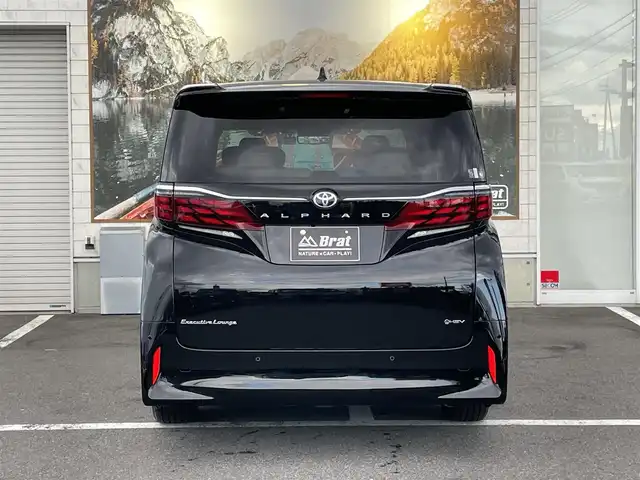 トヨタ アルファードハイブリット エグゼクティブ ラウンジ 長野県 2023(令5)年 1.4万km ブラック ワンオーナー/14インチ純正ディスプレイオーディオ（コネクティッドナビ対応）/ニュートラルベージュレザーシート/左右独立ムーンルーフ/JBLプレミアムサウンドシステム/14インチフリップダウンモニター（リヤエンターテインメントシステム）/メーカーオプションCD/DVDデッキ/メーカーオプション両側ユニバーサルステップ/エグゼクティブラウンジ用フロアマット/AC100V電源/おくだけ充電/トヨタセーフティセンス/ドアバイザー/バックカメラ・全方位カメラ/ETC2.0/前後ドライブレコーダー/両側パワースライドドア/プッシュスタート/追従機能付クルーズコントロール/オットマン